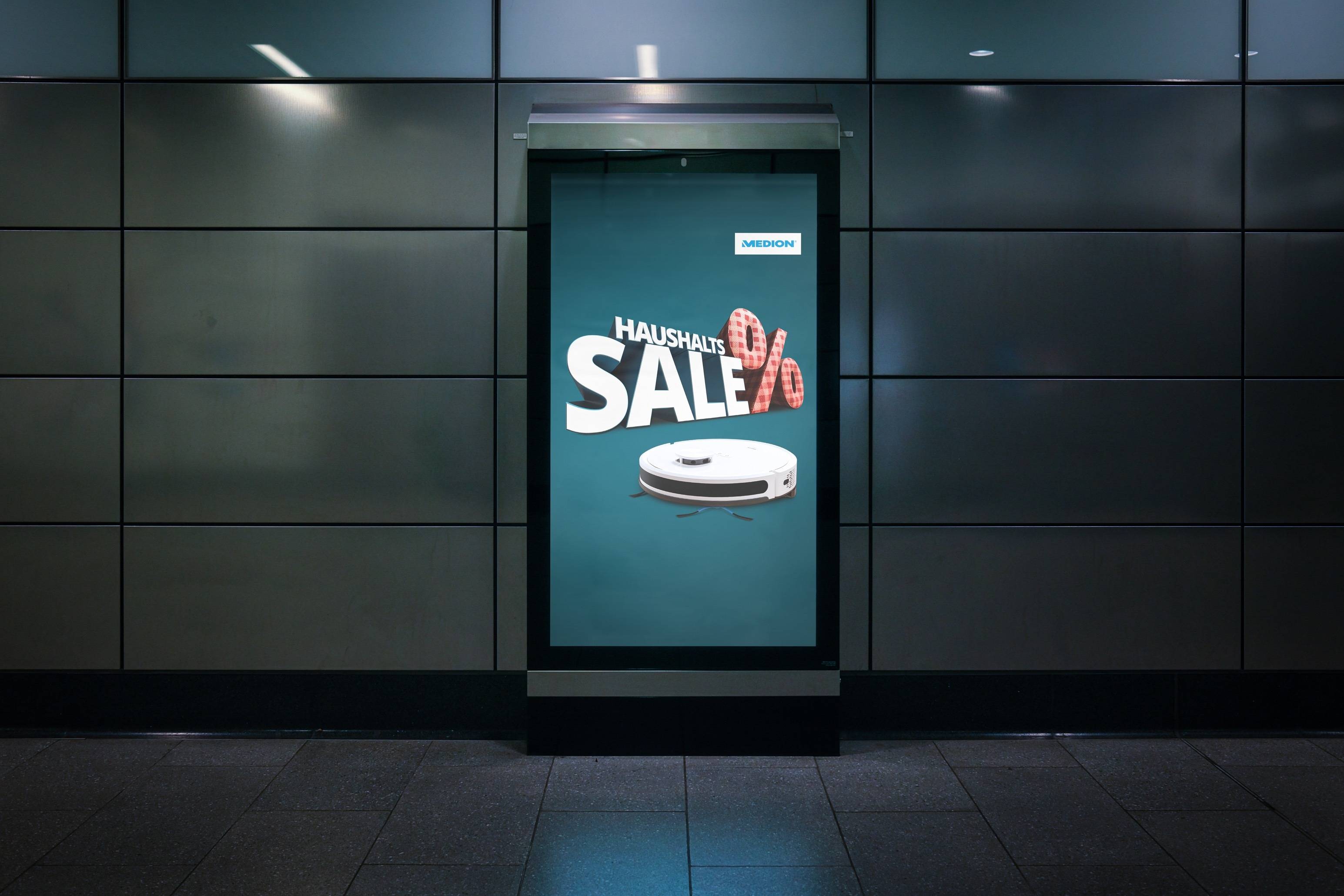 Medion vacuum cleaner advertisement on a billboard in the subway
